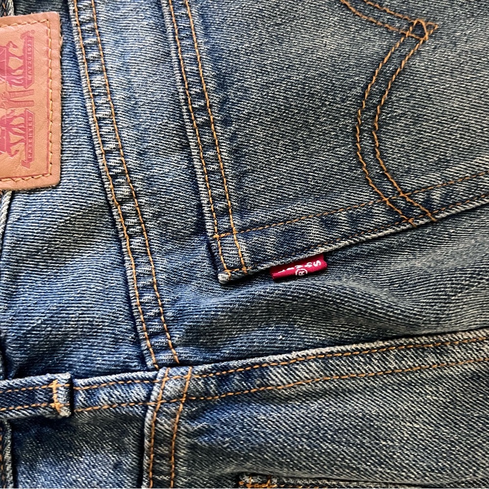 Levi's Dark Blue Denim with Orange Stitching